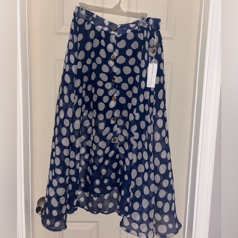New Truly 4 You women's navy blue and white polka dot skirt.